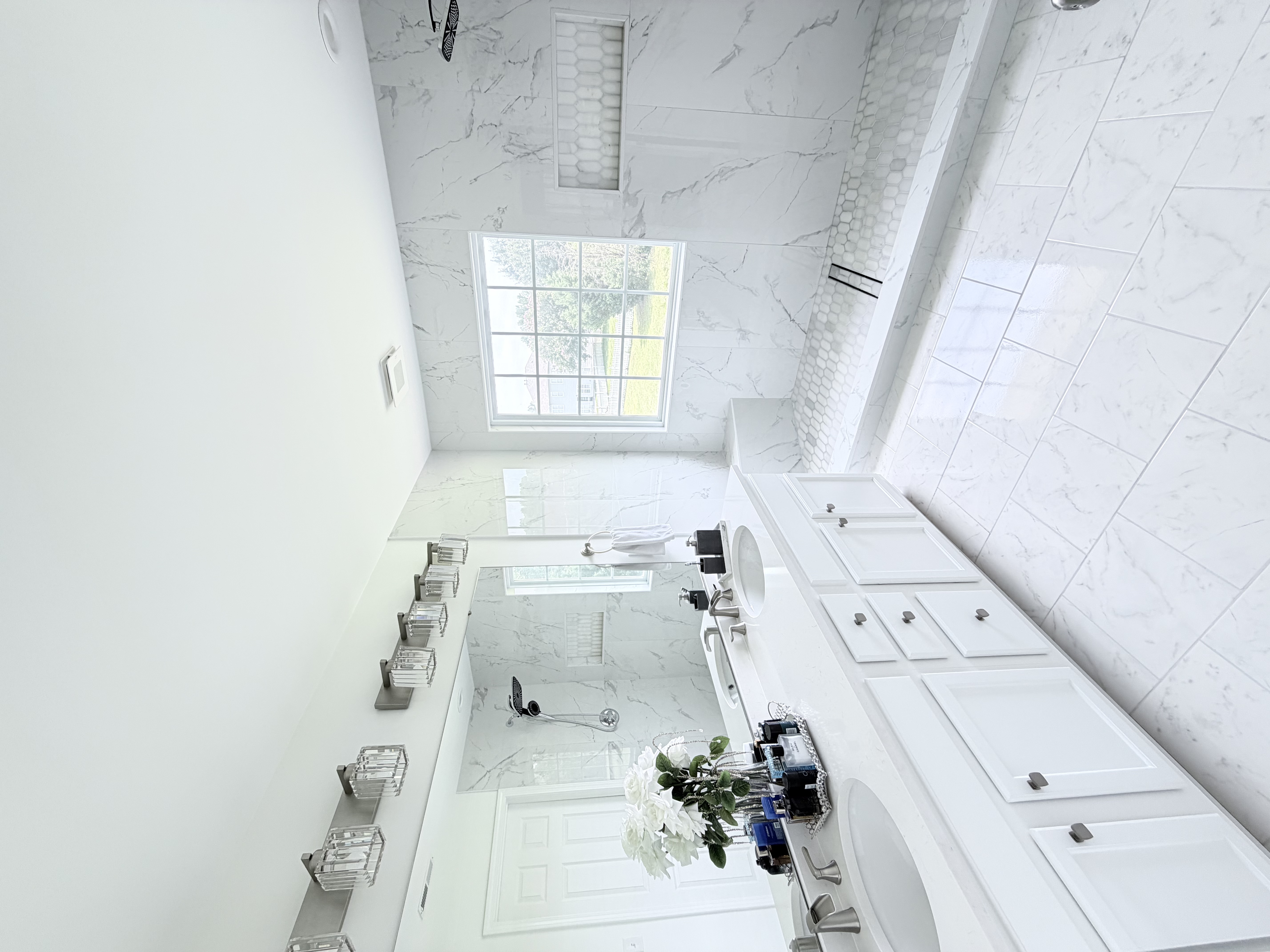 Luxury master bathroom — marble vanity and flooring