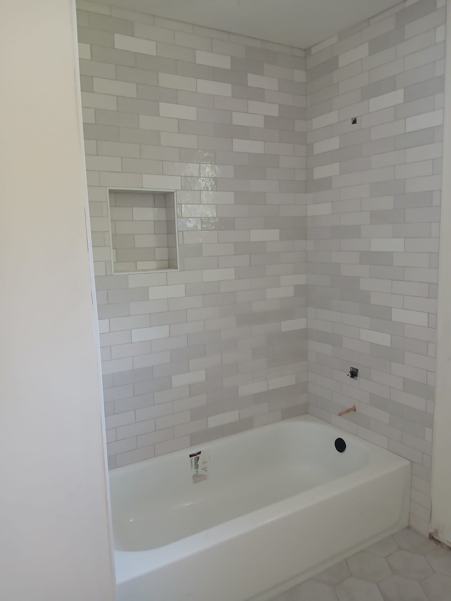 Subway tile surround — bathroom